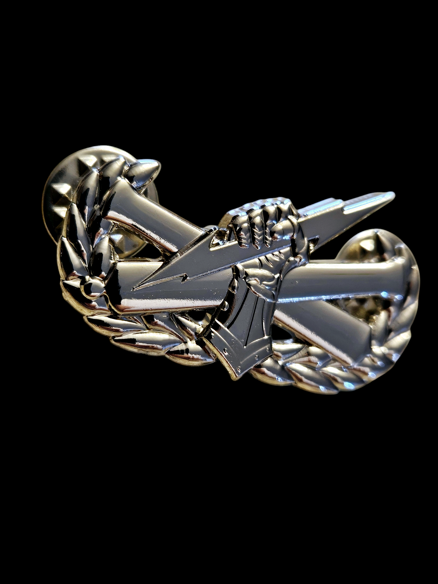 Chrome "pin on" fist badge