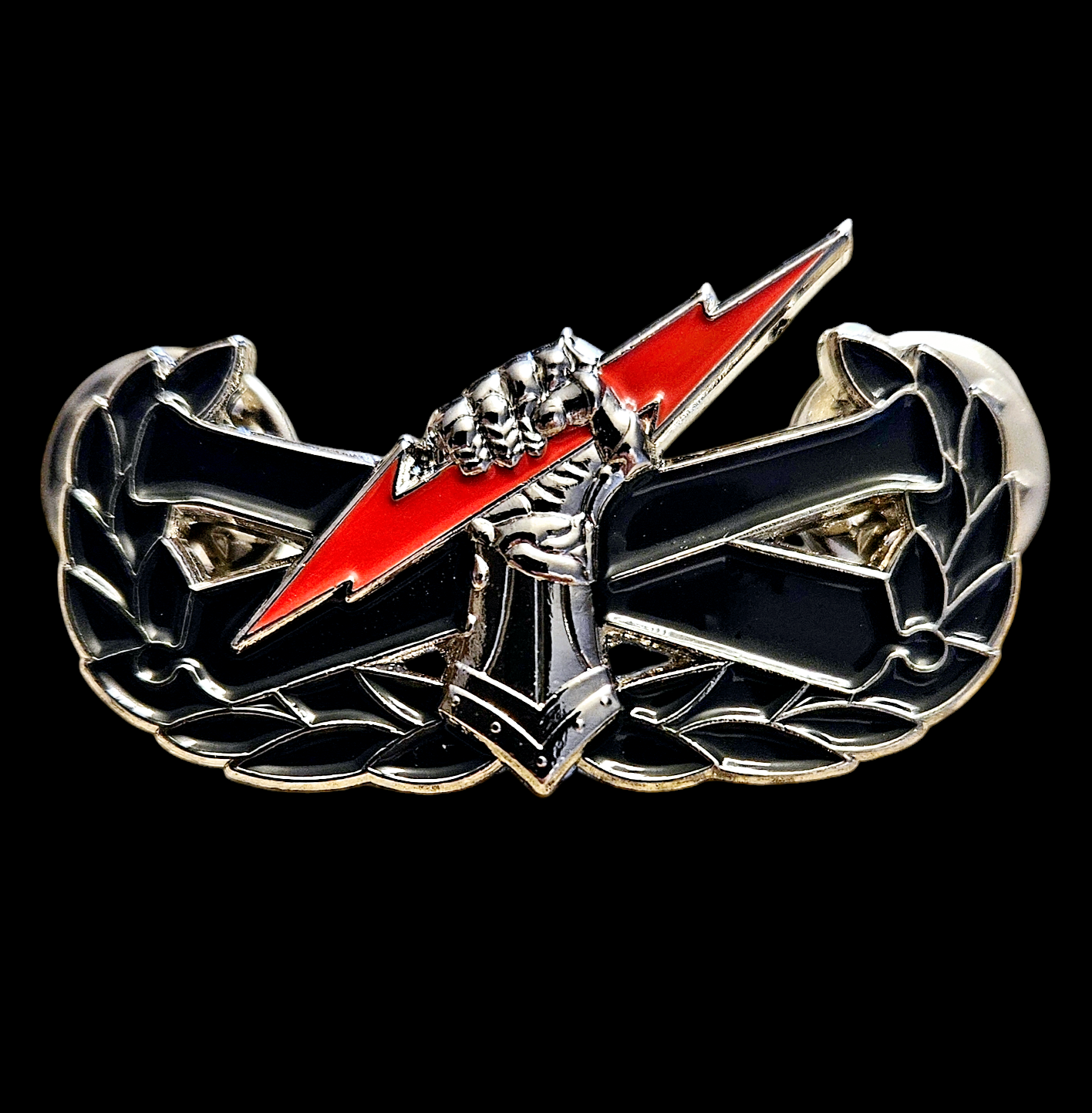 Colored "pin on" fist badge