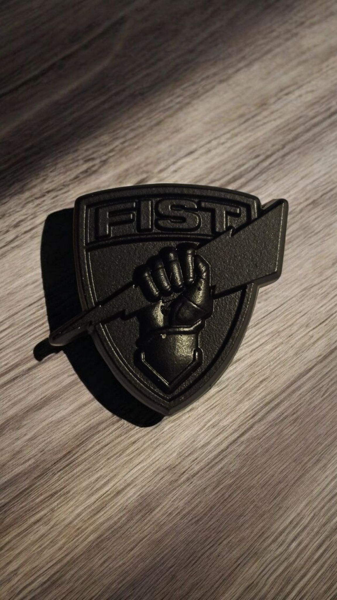 Black shield lapel pin