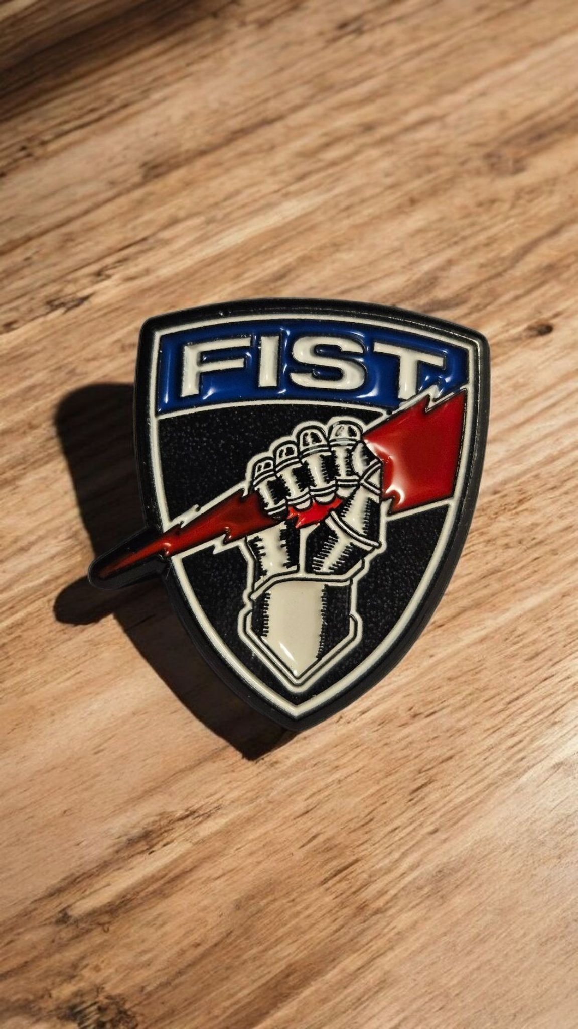 Colored shield lapel pin