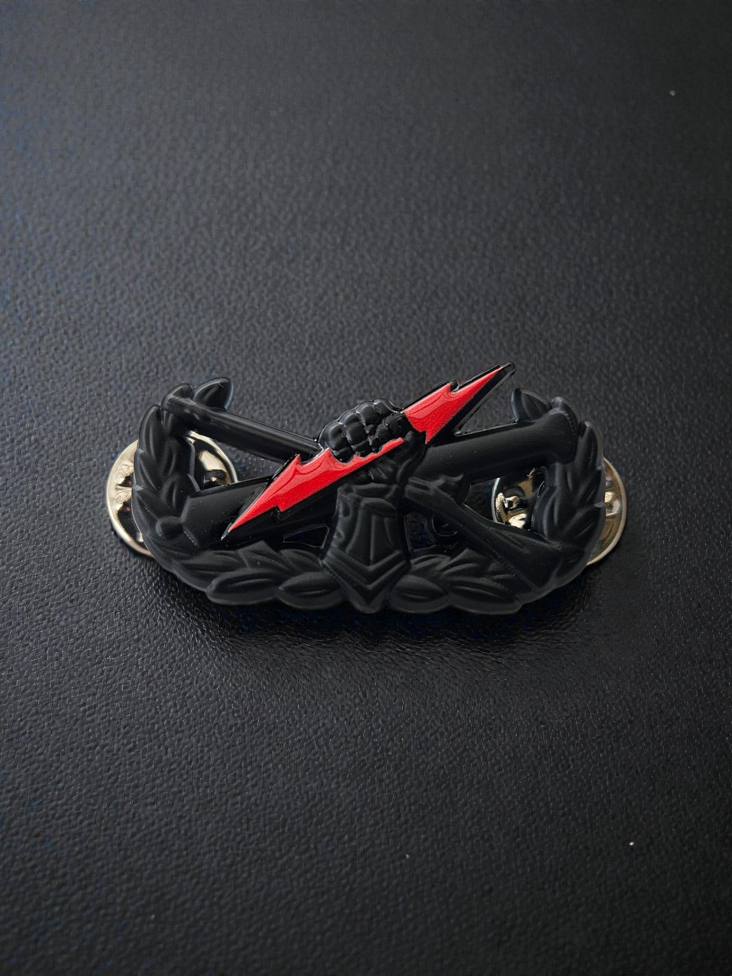 Red bolt "pin on" fist badge