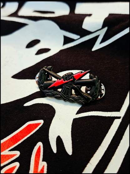 Red bolt "pin on" fist badge