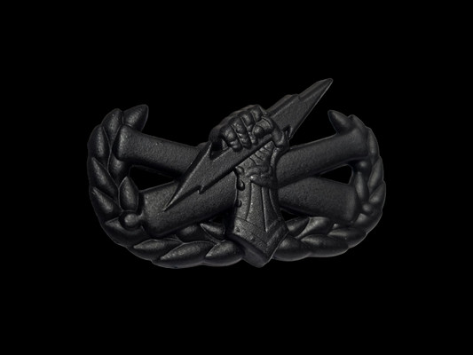 Black "pin on" fist badge