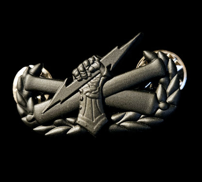 Black "pin on" fist badge